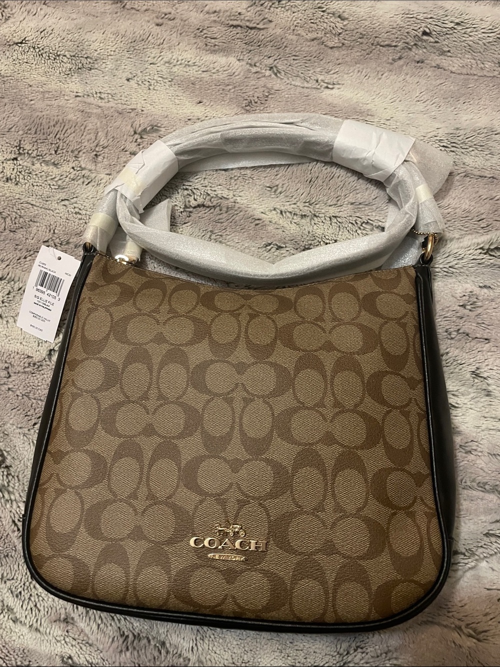 NWT’s:  Coach Ellie File Bag in signature vinyl canvas.